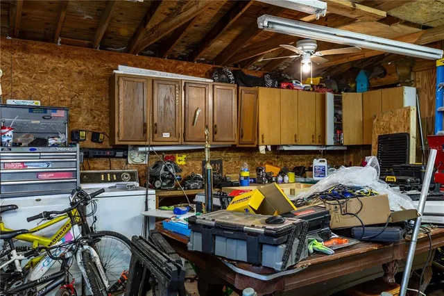 a view of two chairs in the balcony