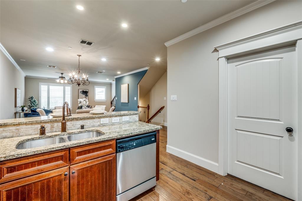 1600 Abrams Road, Unit 54 Dallas, TX 75214 - Photo 14 of 23 a view of a kitchen counter space and wooden floor