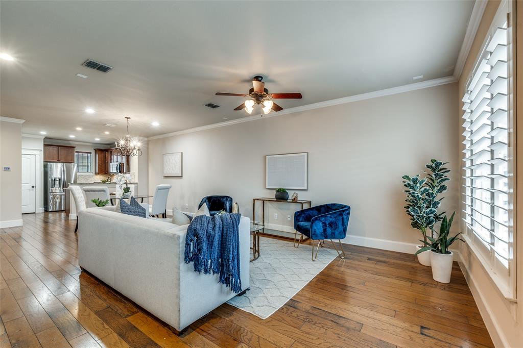 1600 Abrams Road, Unit 54 Dallas, TX 75214 - Photo 6 of 23 a living room with furniture and a chandelier