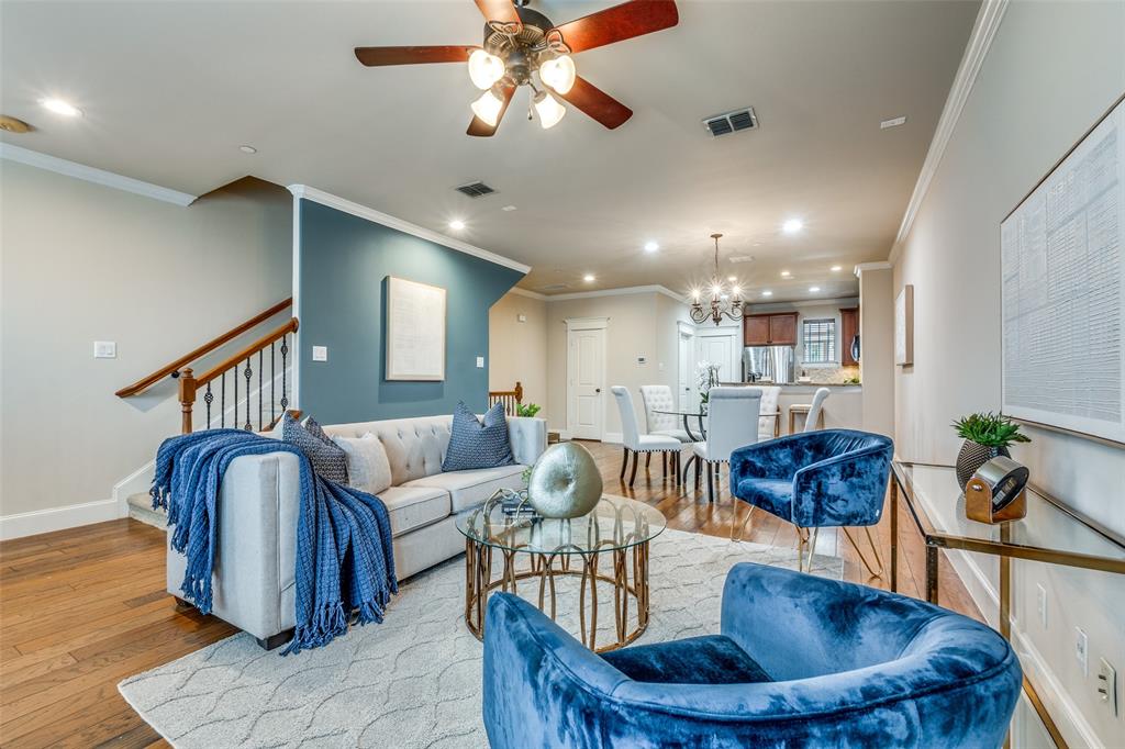 1600 Abrams Road, Unit 54 Dallas, TX 75214 - Photo 8 of 23 a living room with furniture a dining table and paintings on the wall