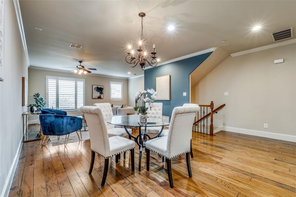 1600 Abrams Road, Unit 54 Dallas, TX 75214 - Photo 10 of 23 a view of a dining room with furniture wooden floor and chandelier
