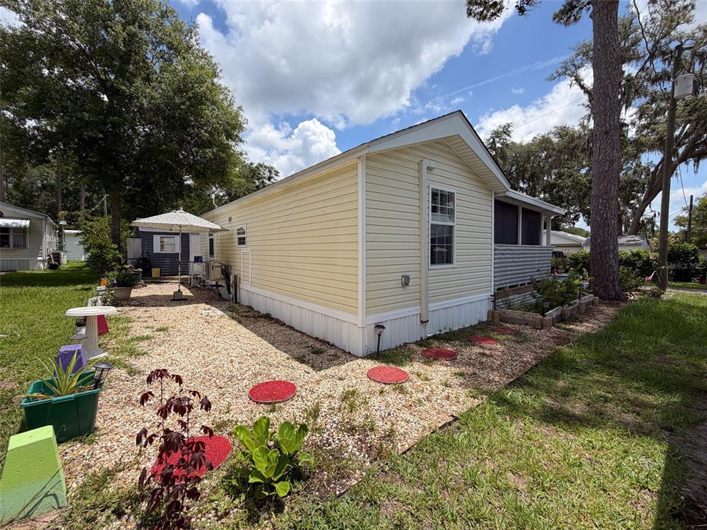 2092 Culbreath Road, Unit A42 Brooksville, FL 34602 - Photo 51 of 70 a front view of house with yard