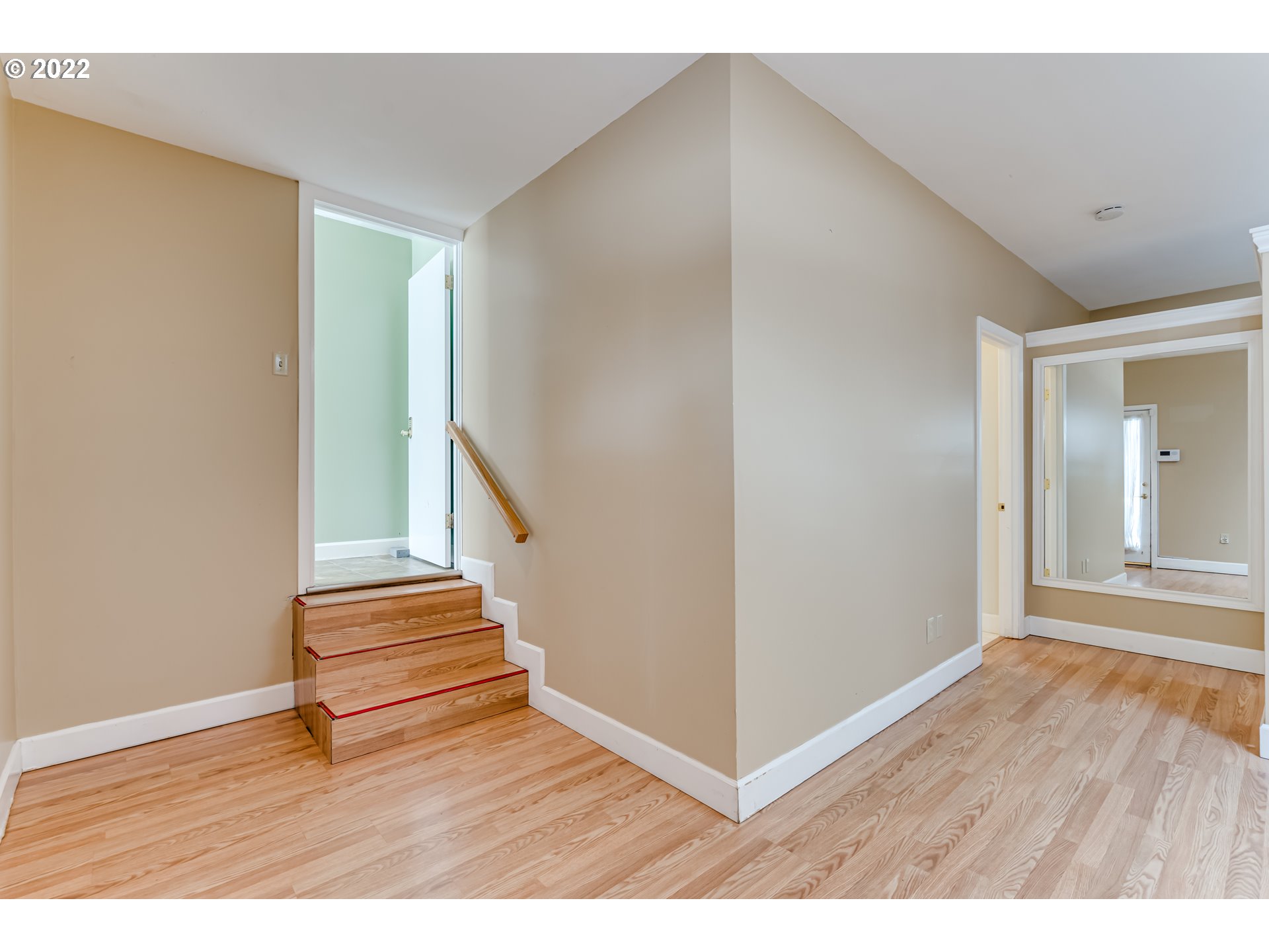 595 Dartmoor Drive Eugene, OR 97401 - Photo 12 of 32 a view of an entryway with wooden floor