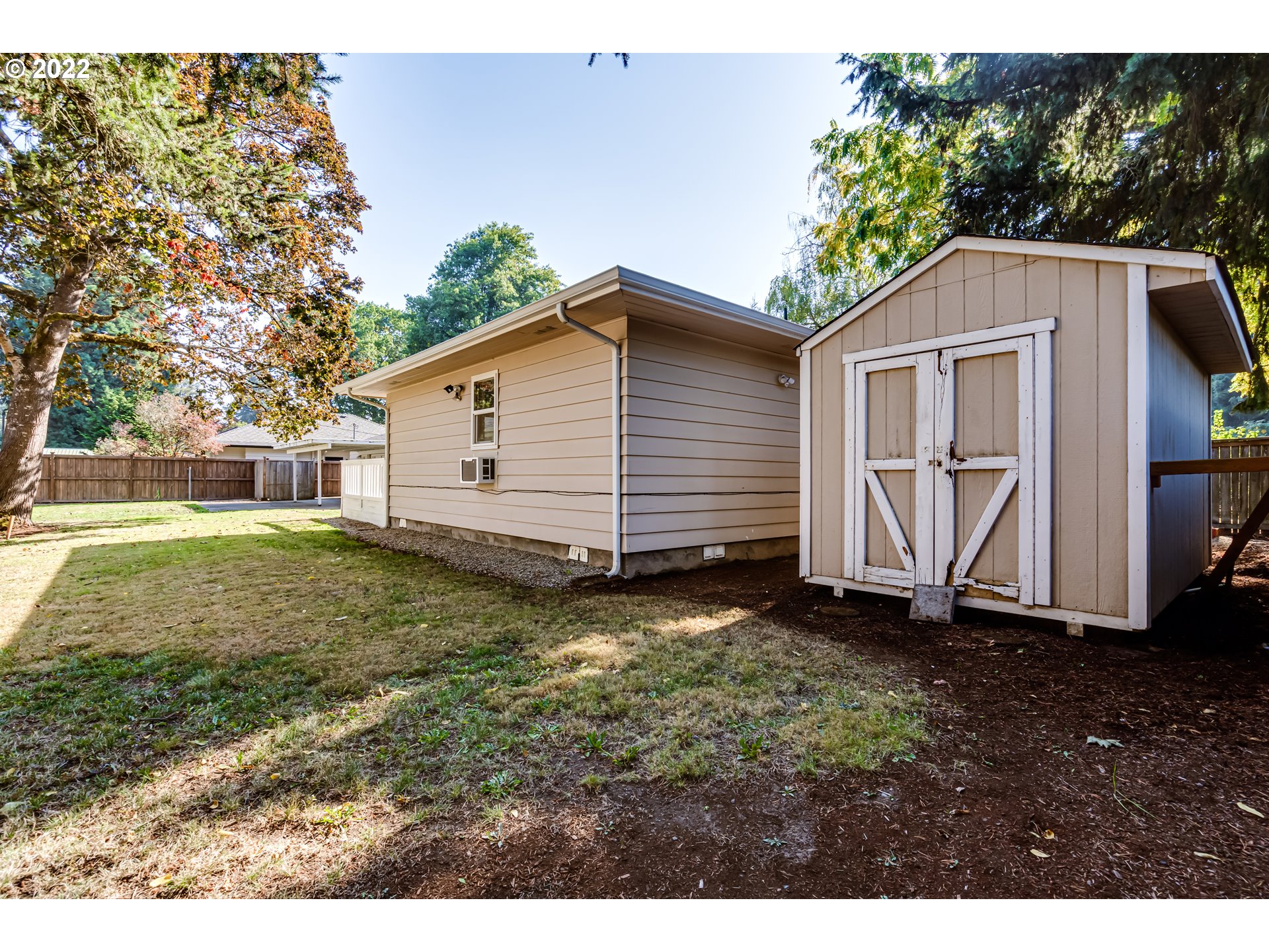595 Dartmoor Drive Eugene, OR 97401 - Photo 32 of 32 a house with trees in the background