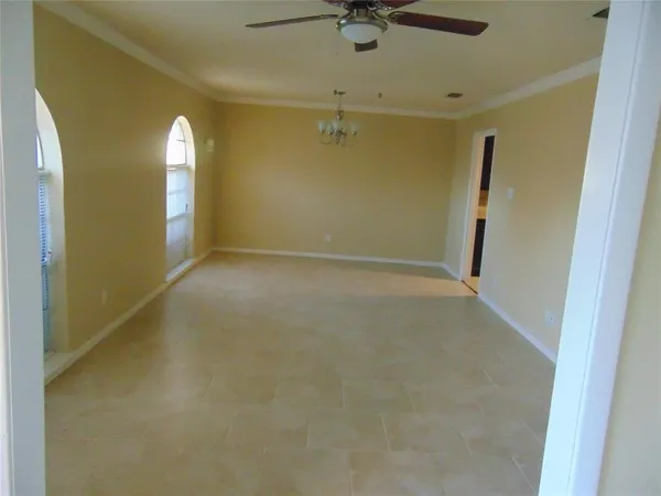 an empty room with a mirror