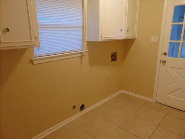 a view of a room with a window