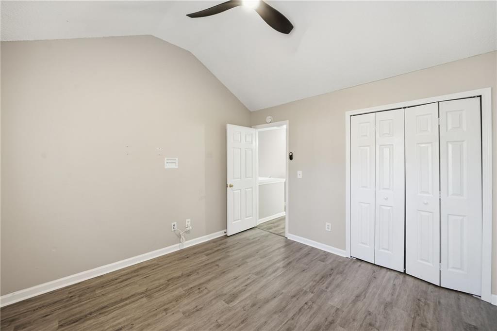 2297 Charleston Pointe Southeast Atlanta, GA 30316 - Photo 25 of 48 a view of an empty room with wooden floor
