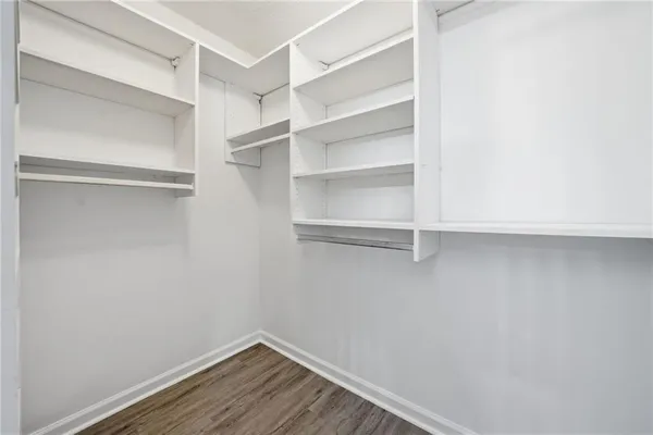 a view of an empty walk in closet