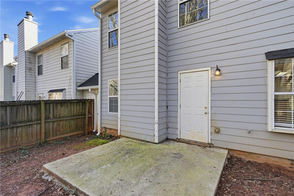 2297 Charleston Pointe Southeast Atlanta, GA 30316 - Photo 35 of 48 a view of a house with a backyard