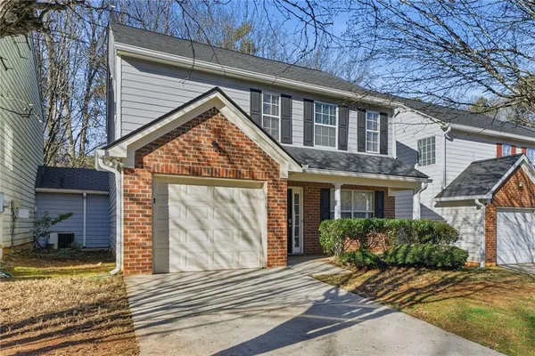 a view of a house with a patio