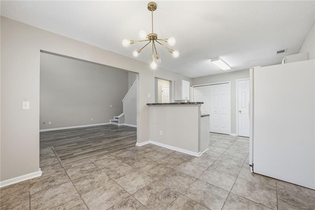 2297 Charleston Pointe Southeast Atlanta, GA 30316 - Photo 7 of 48 a view of a kitchen with a sink and a window