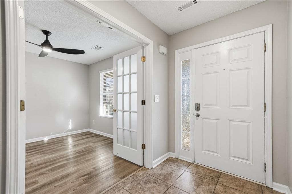 2297 Charleston Pointe Southeast Atlanta, GA 30316 - Photo 9 of 48 a view of entryway with wooden floor