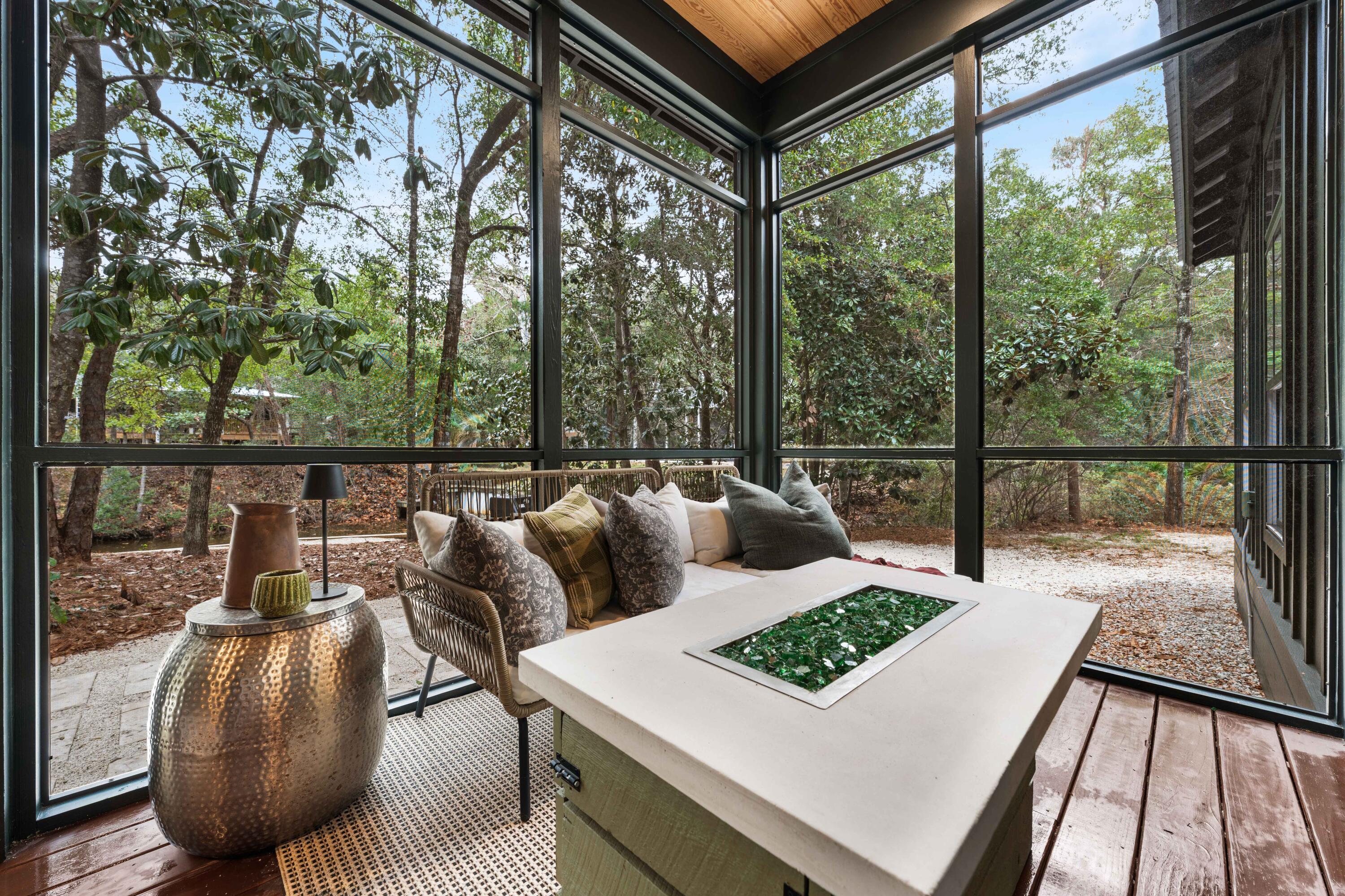 294 West Point Washington Road Santa Rosa Beach, FL 32459 - Photo 18 of 46 a view of a patio with couches and table and chairs