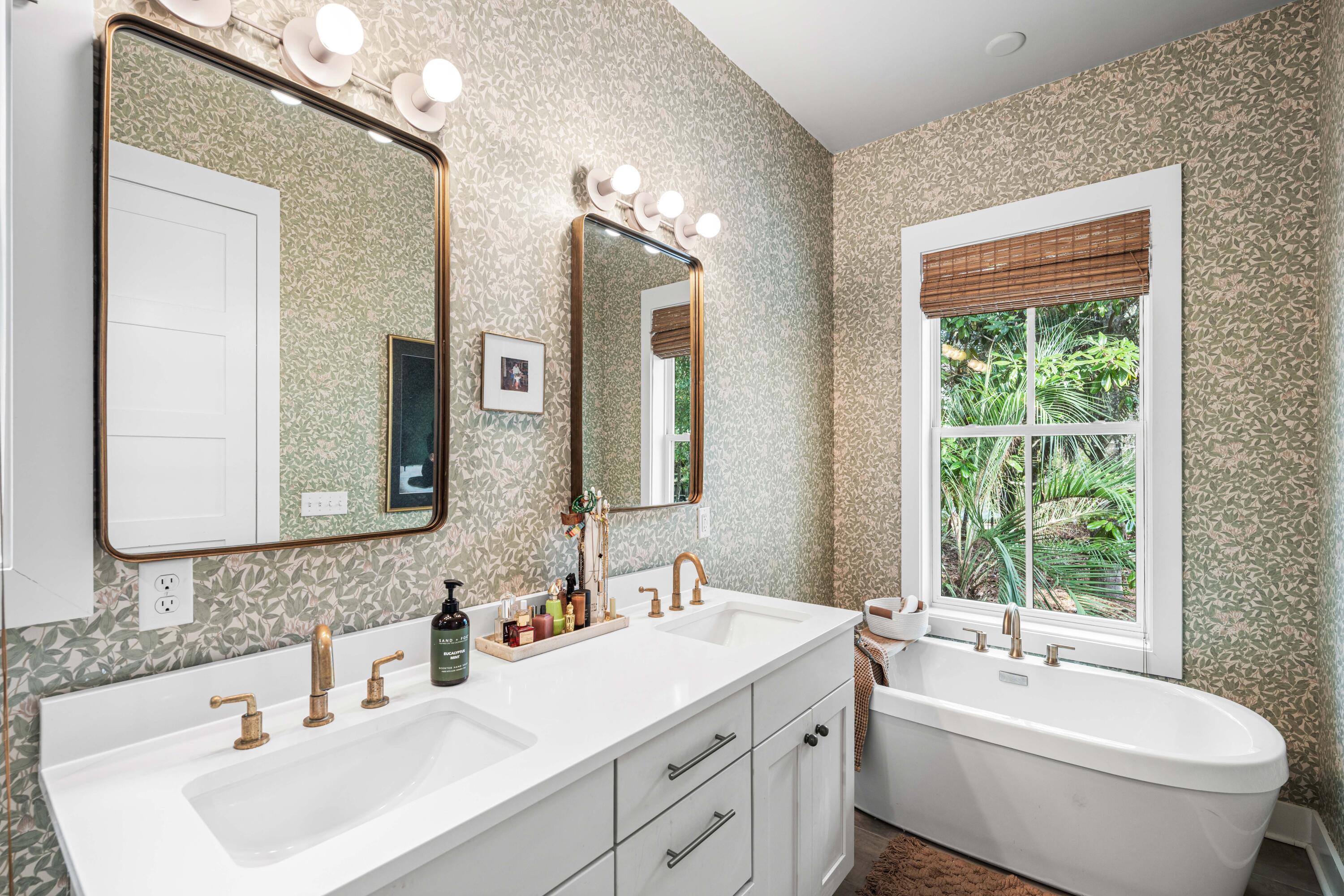 294 West Point Washington Road Santa Rosa Beach, FL 32459 - Photo 25 of 46 a bathroom with a double vanity sink toilet and mirror