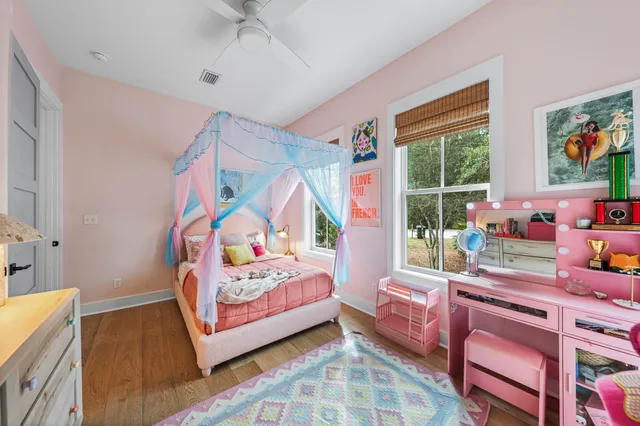 a bedroom with a bed and a couch