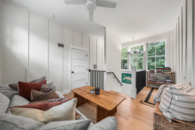 a living room with furniture and a table
