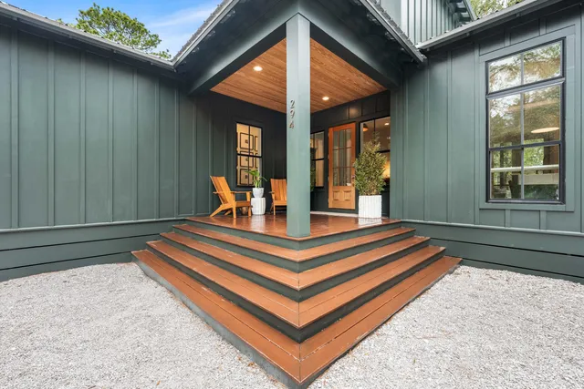 a front view of a house with a backyard