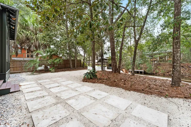 a backyard of a house with lots of green space
