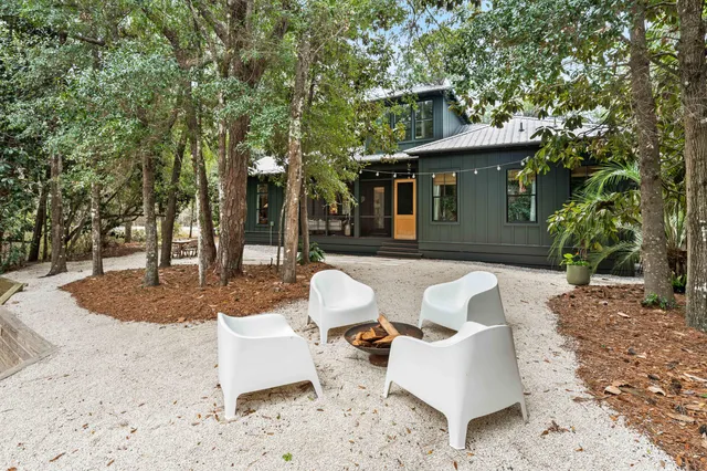 a view of a patio in the backyard