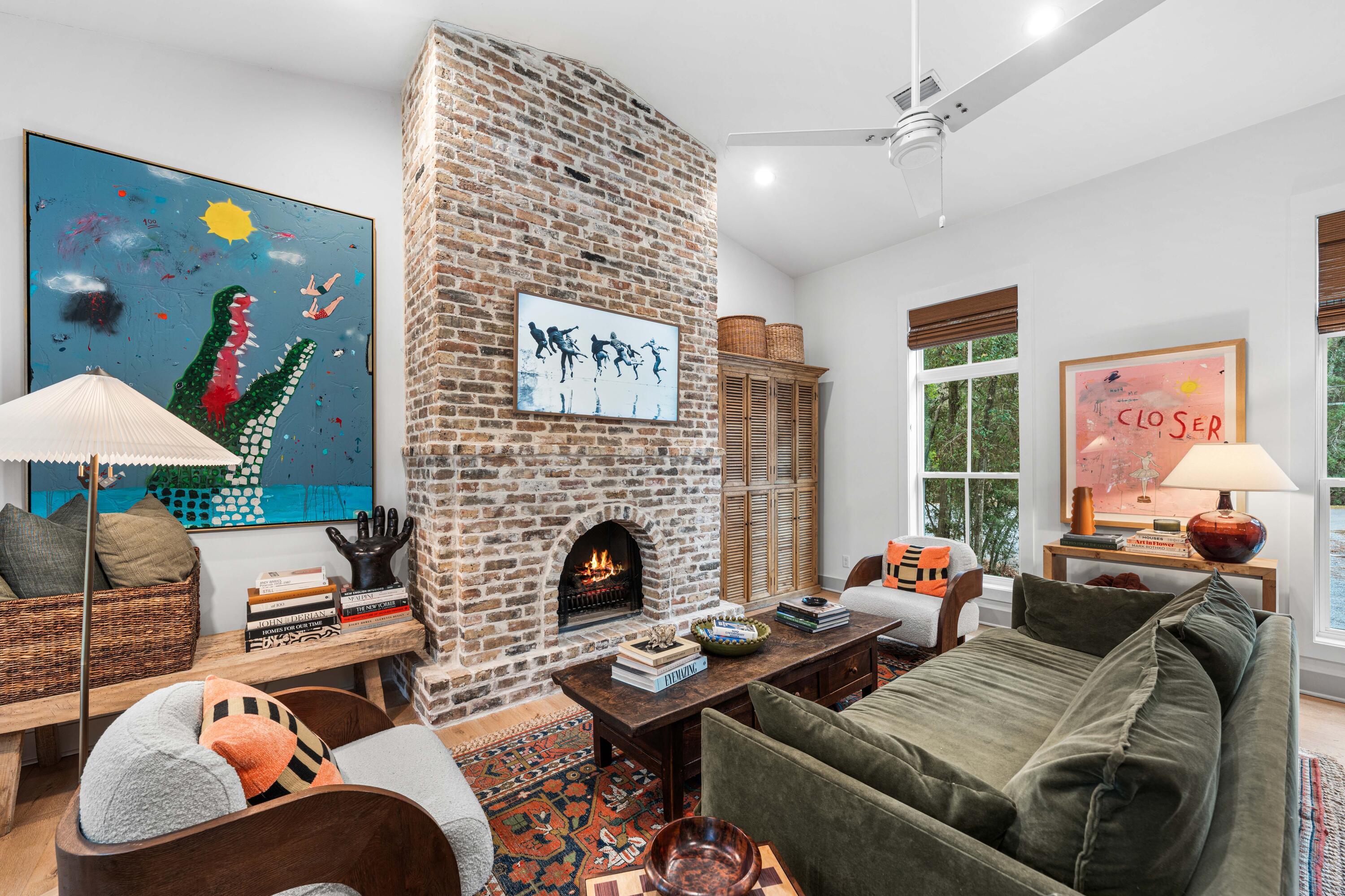 294 West Point Washington Road Santa Rosa Beach, FL 32459 - Photo 10 of 46 a living room with furniture and a fireplace