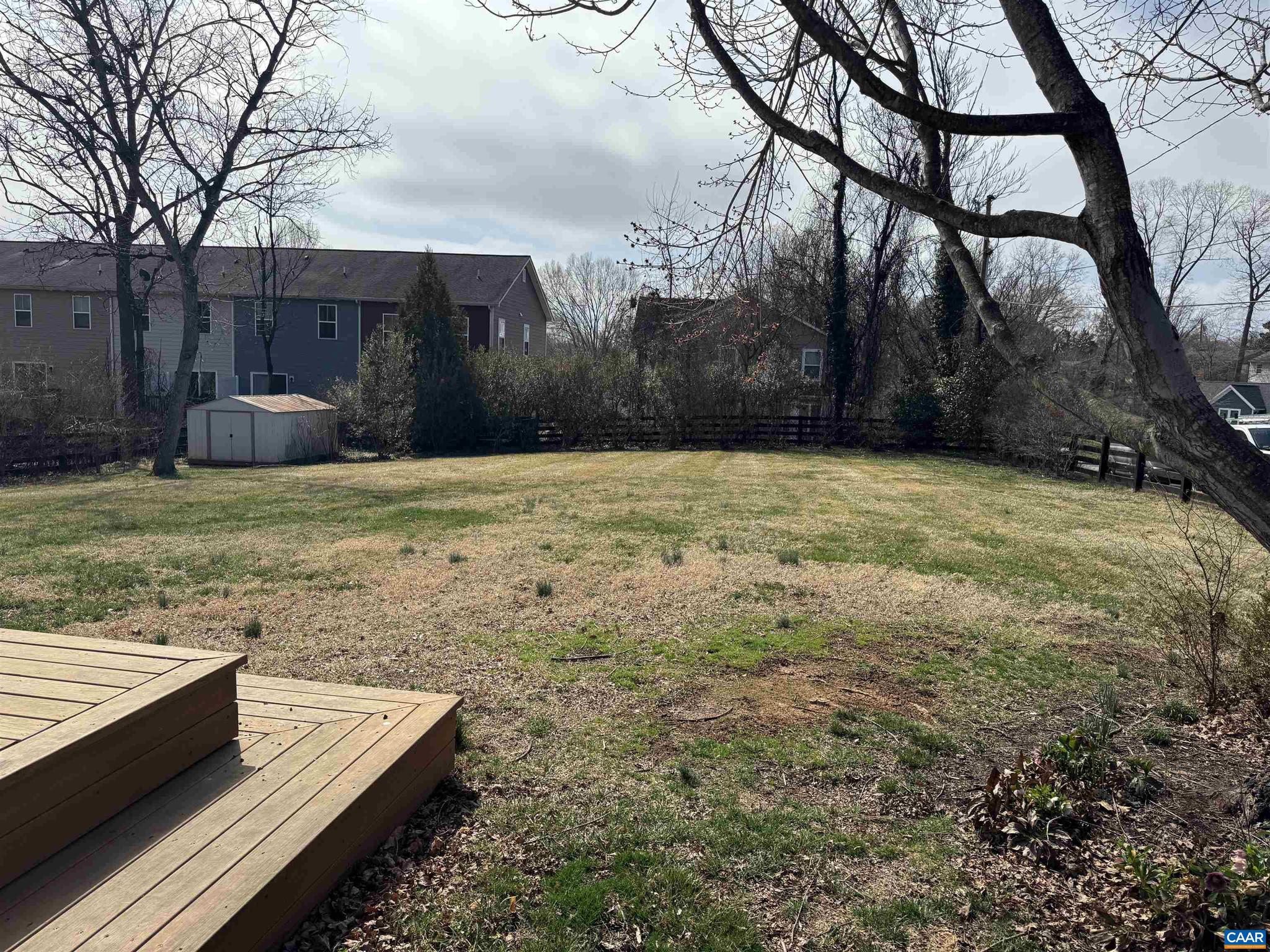 402 Harris Road Charlottesville, VA 22903 - Photo 4 of 10 a view of a backyard with large trees