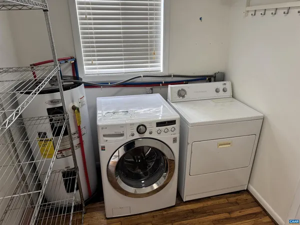 a utility room with dryer and washer