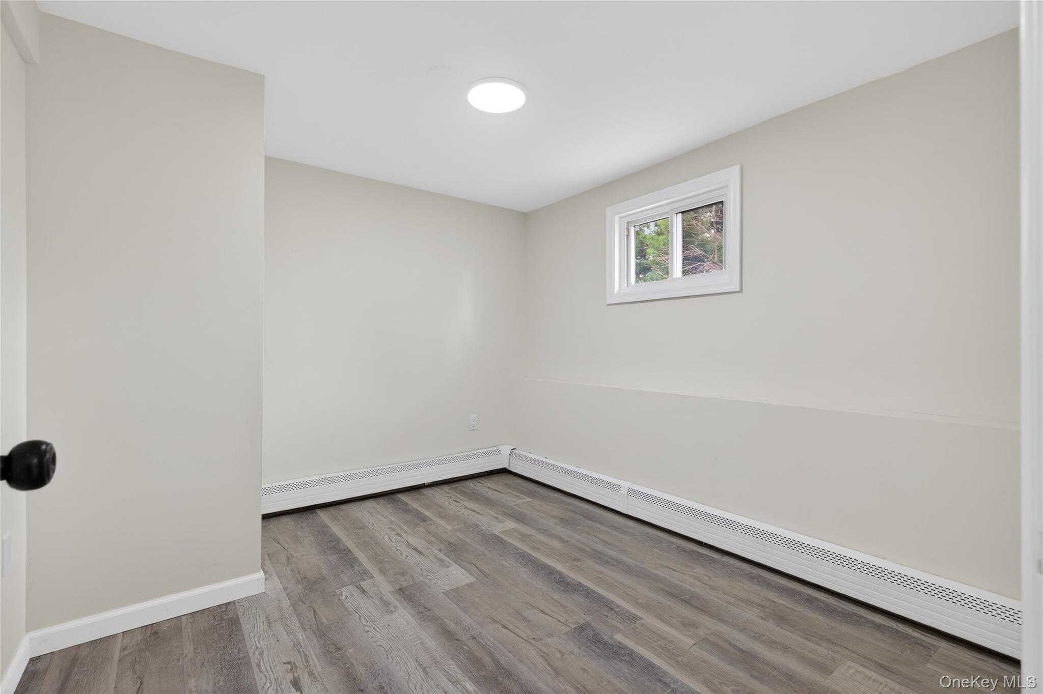 15 Lindsay Street Huntington, NY 11743 - Photo 18 of 23 wooden floor in an empty room