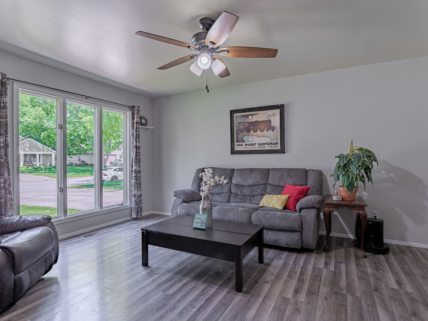 33 Ingleshire Road Montgomery, IL 60538 - Photo 3 of 22 a living room with furniture and a large window