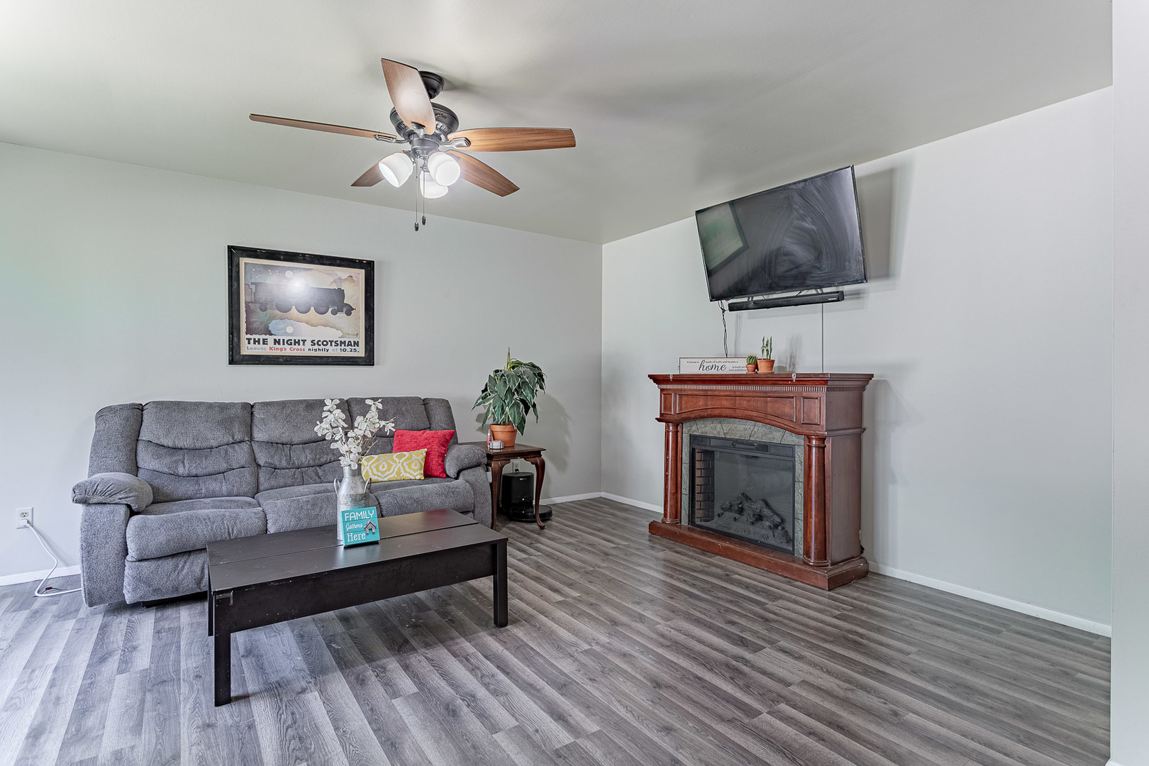 33 Ingleshire Road Montgomery, IL 60538 - Photo 4 of 22 a living room with furniture and a fireplace