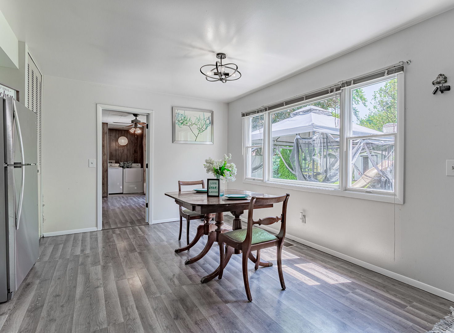 33 Ingleshire Road Montgomery, IL 60538 - Photo 8 of 22 a view of a dining room with furniture window and wooden floor