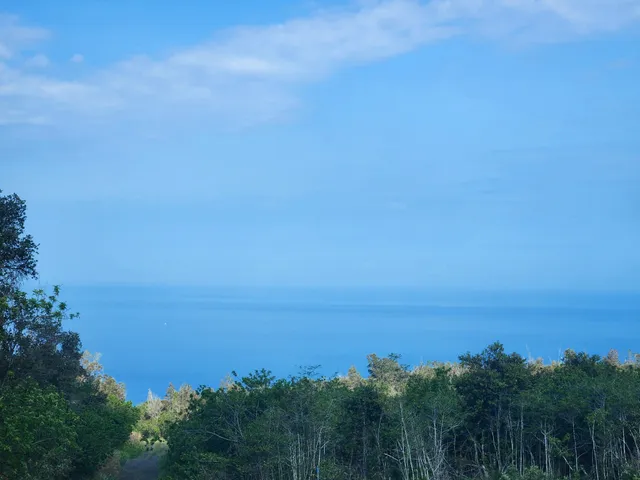 a view of ocean with beach