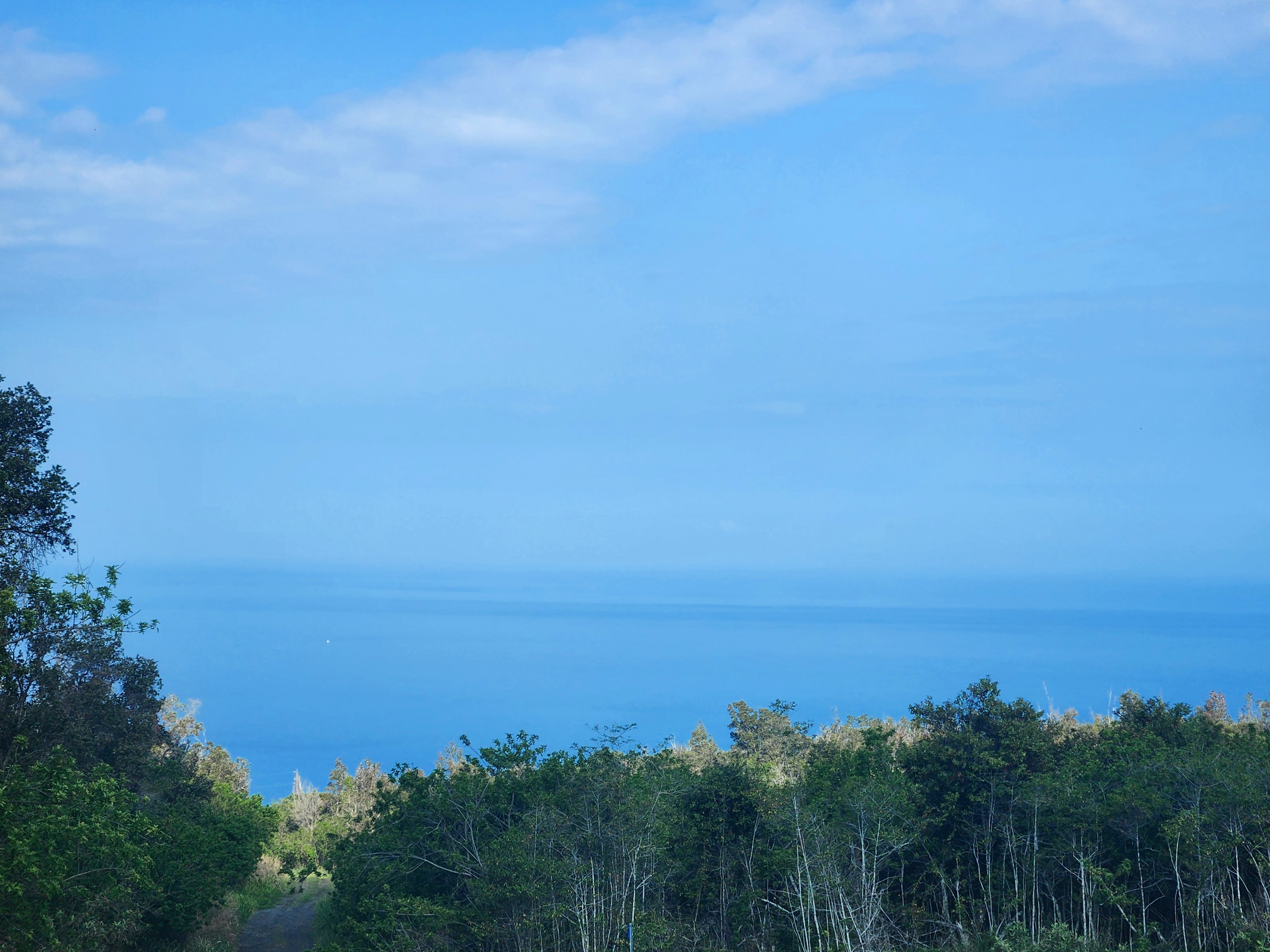 a view of ocean with beach