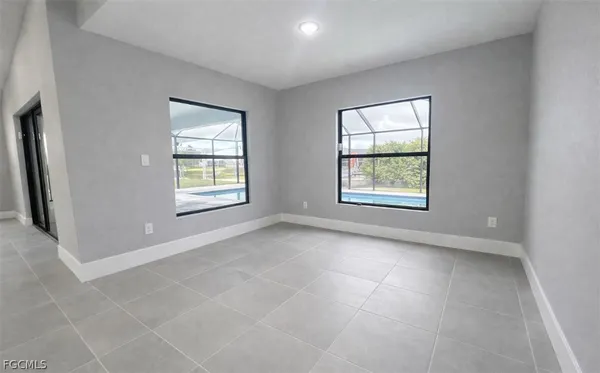 an empty room with windows