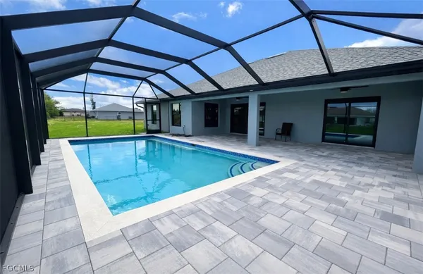 a view of a backyard of a house