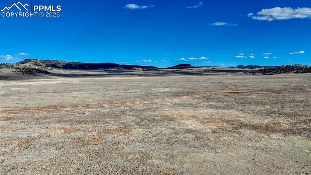 L5209 To-Ma-Kin Circle Hartsel, CO 80449 - Photo 21 of 26 a view of a lake and a building