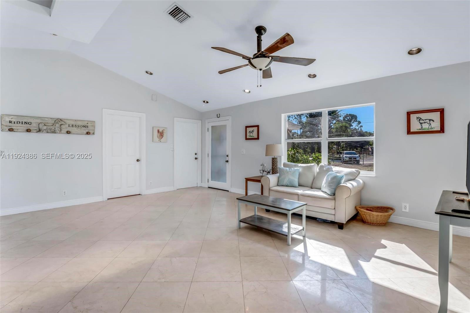17607 88th Road North Loxahatchee, FL 33470 - Photo 14 of 56 a living room with furniture
