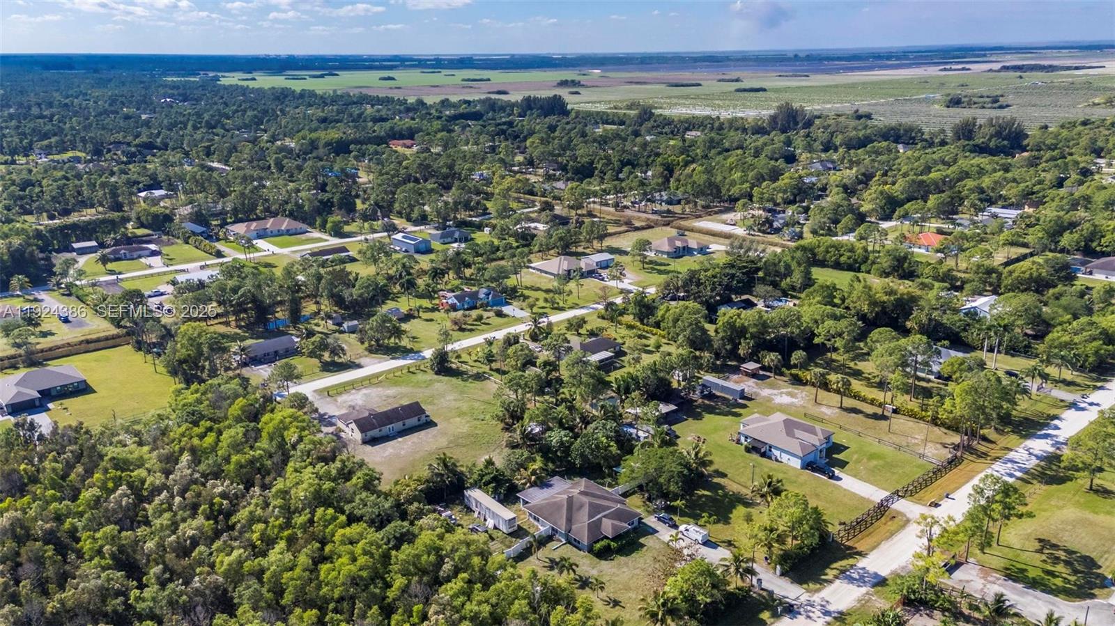 17607 88th Road North Loxahatchee, FL 33470 - Photo 46 of 56 an aerial view of multiple house