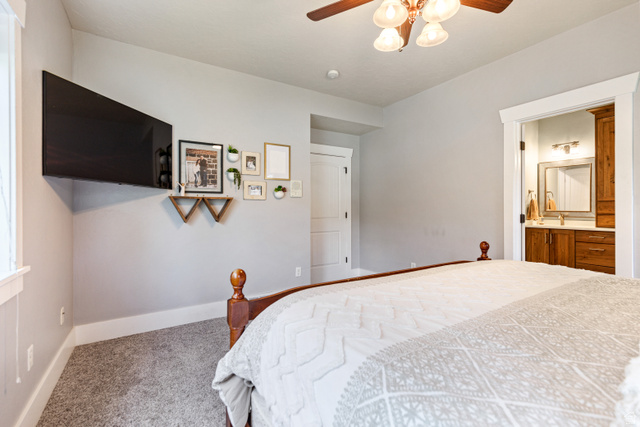 580 Cherry Ridge Lane Richmond, UT 84333 - Photo 17 of 53 Master bedroom with baseboards and a ceiling fan