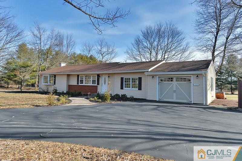 133 Allens Corner Road Flemington, NJ 08822 - Photo 1 of 13 a front view of house with yard and trees around