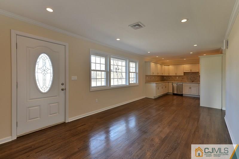 133 Allens Corner Road Flemington, NJ 08822 - Photo 3 of 13 wooden floor in an empty room with a window
