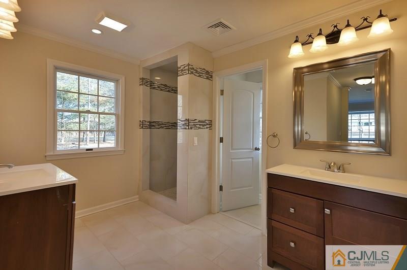 133 Allens Corner Road Flemington, NJ 08822 - Photo 8 of 13 a bathroom with a double vanity sink mirror and double