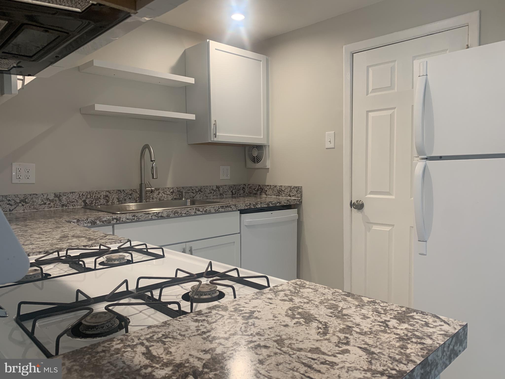 163 Wiltshire Road Claymont, DE 19703 - Photo 14 of 32 New kitchen with new cabinets and countertops