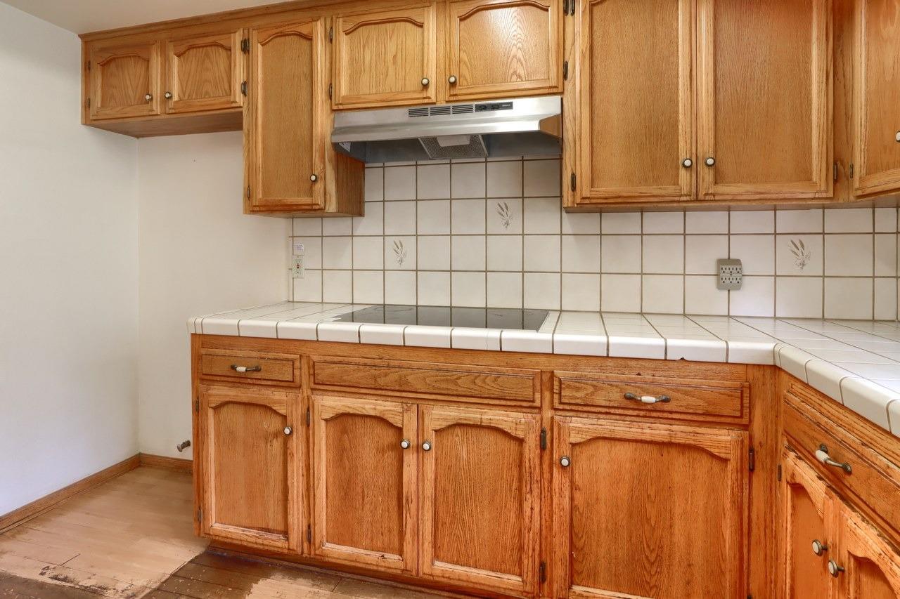 51973 Montgomery Drive Oakhurst, CA 93644 - Photo 20 of 50 a kitchen with stainless steel appliances granite countertop a sink and cabinets