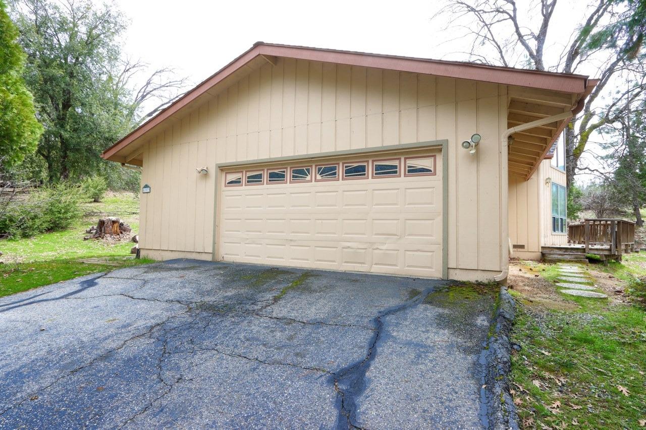 51973 Montgomery Drive Oakhurst, CA 93644 - Photo 45 of 50 a view of a house with a yard