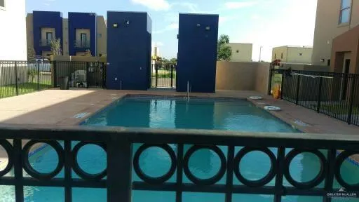a kitchen with a table and chairs