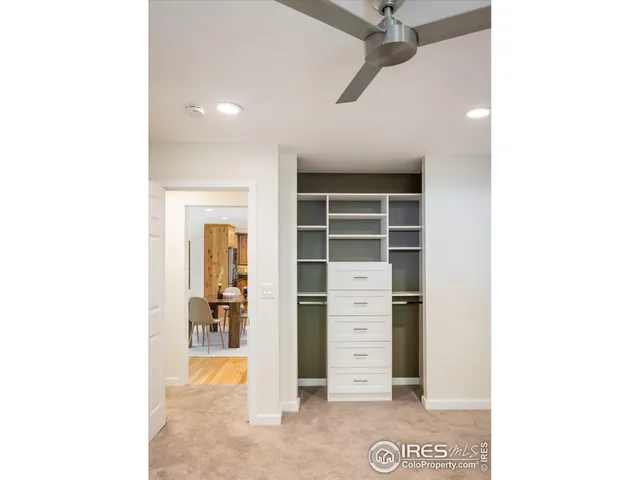 a bathroom with a sink a mirror and a shower