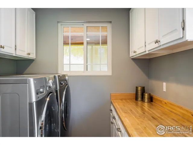 a view of a hallway with the glass windows