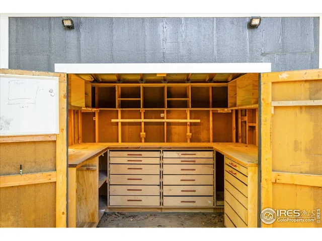a view of a swimming pool with an outdoor space and seating area