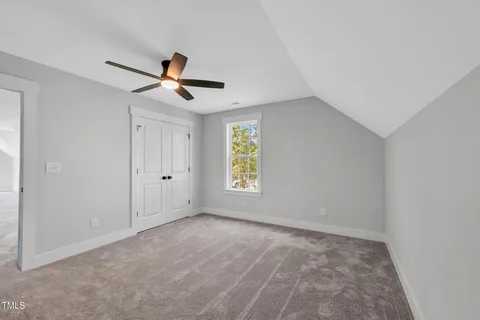 a view of a room with wooden floor and balcony