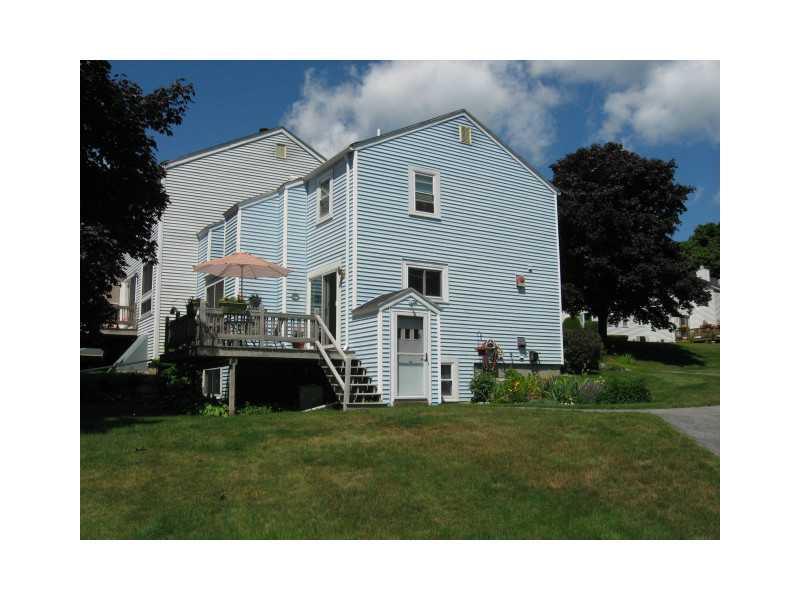 22 Black Point Road, Unit 3E Scarborough, ME 04074 - Photo 8 of 34 Exterior Back. Walkout from finished...